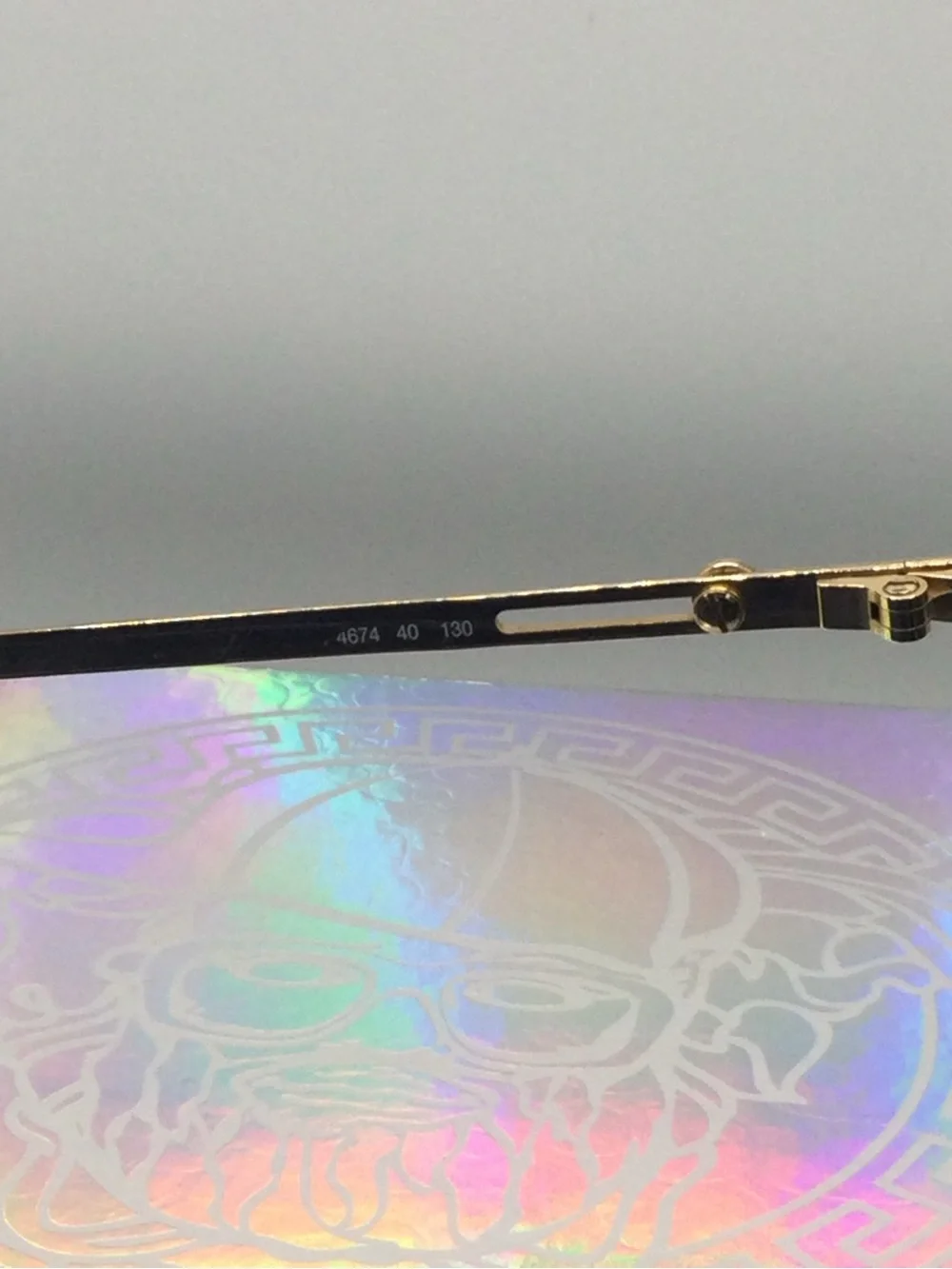 PLAYBOY Gold Frame Sunglasses with Iridescent Lenses